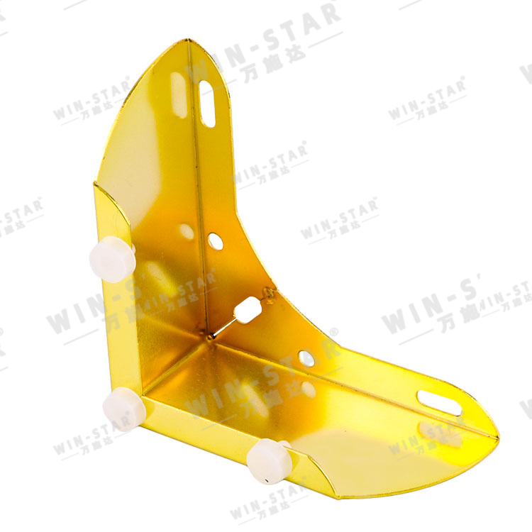 Close-up of the smooth gold and chrome plated surface on the metal furniture legs