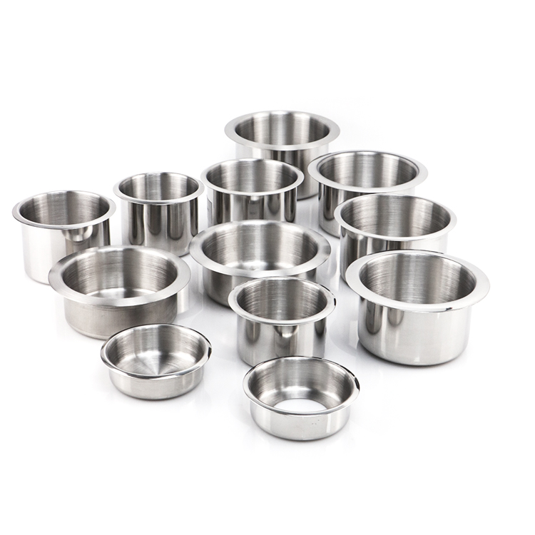 Side profile of the silver metal cup holder showing structural depth for secure beverage storage