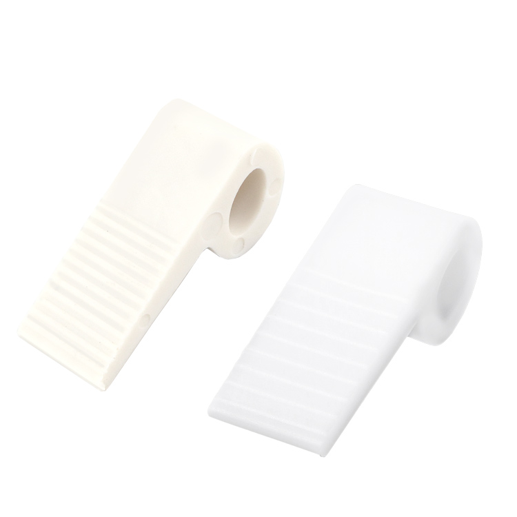 Complete plastic sofa spring clip demonstrating the fool-proof snap-on installation design