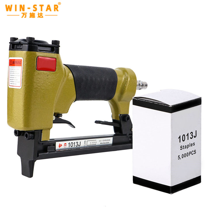 Ergonomic pneumatic nail gun 1013J designed for furniture decoration and woodworking