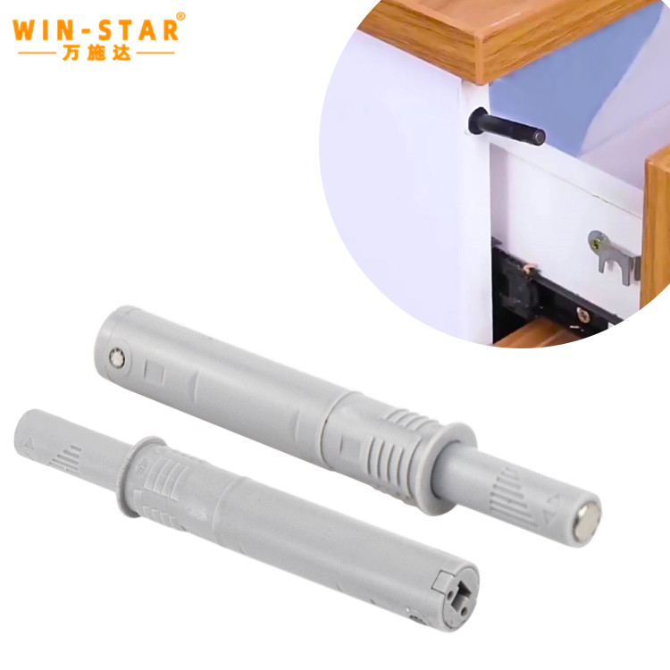 Plastic door bouncer push to open system installed in a modern handleless cabinet