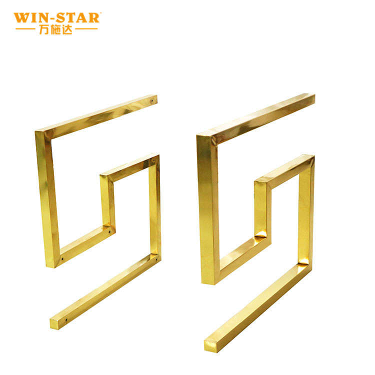 Front angle view of the gold metal sofa chair frame highlighting its stable base