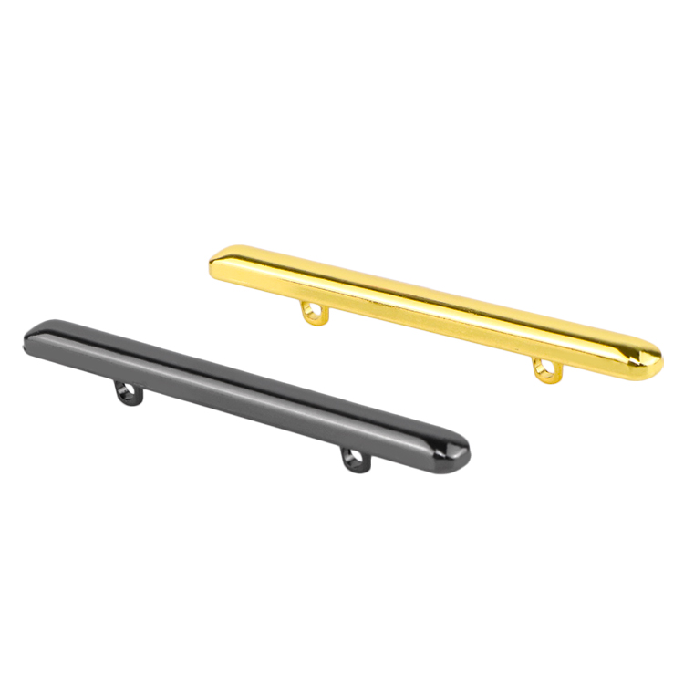 Moisture-resistant metal trim buttons designed for coastal furniture collections