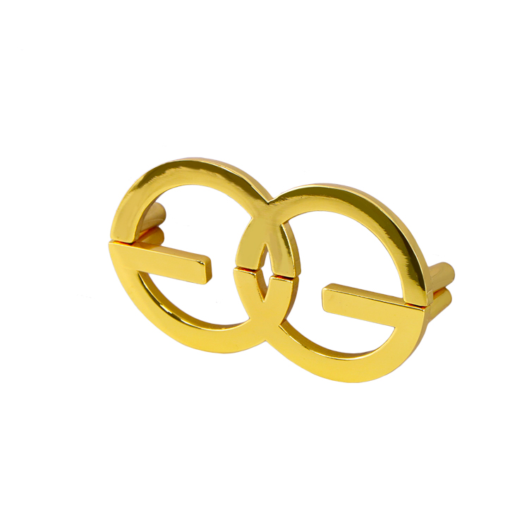 Gold and black furniture embellishment buttons with smooth polished surface