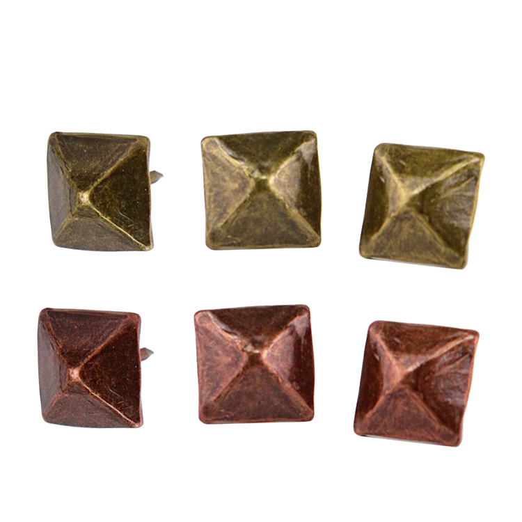 Iron decorative nails applied to a leather sofa edge demonstrating exceptional structural grip and fabric tension hold